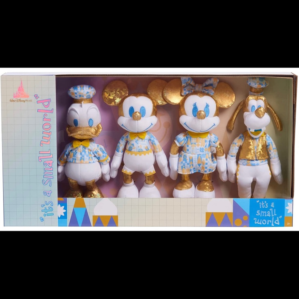 Disney Walt world 50th anniversary celebration it's a small world plush set